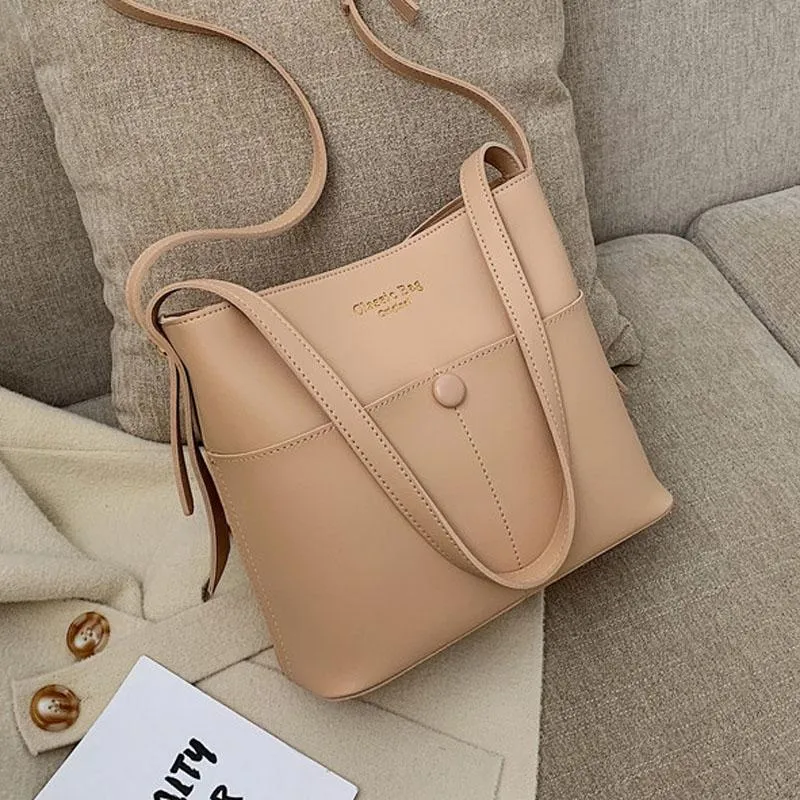 Sac seau crème avec poches