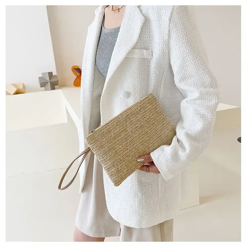Pochette à main tissée avec lanière marron