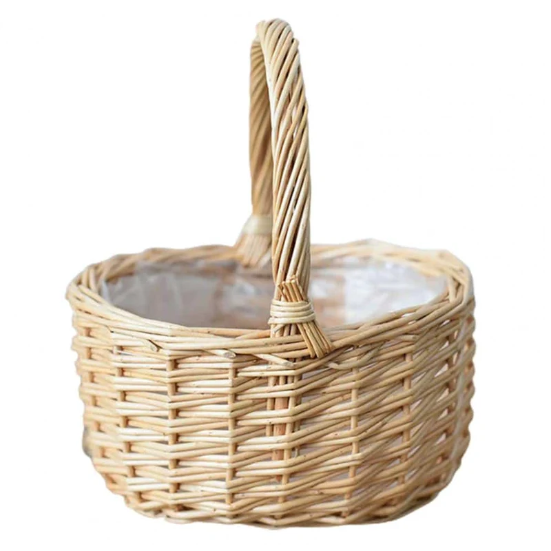 Corbeille en rotin beige avec anse