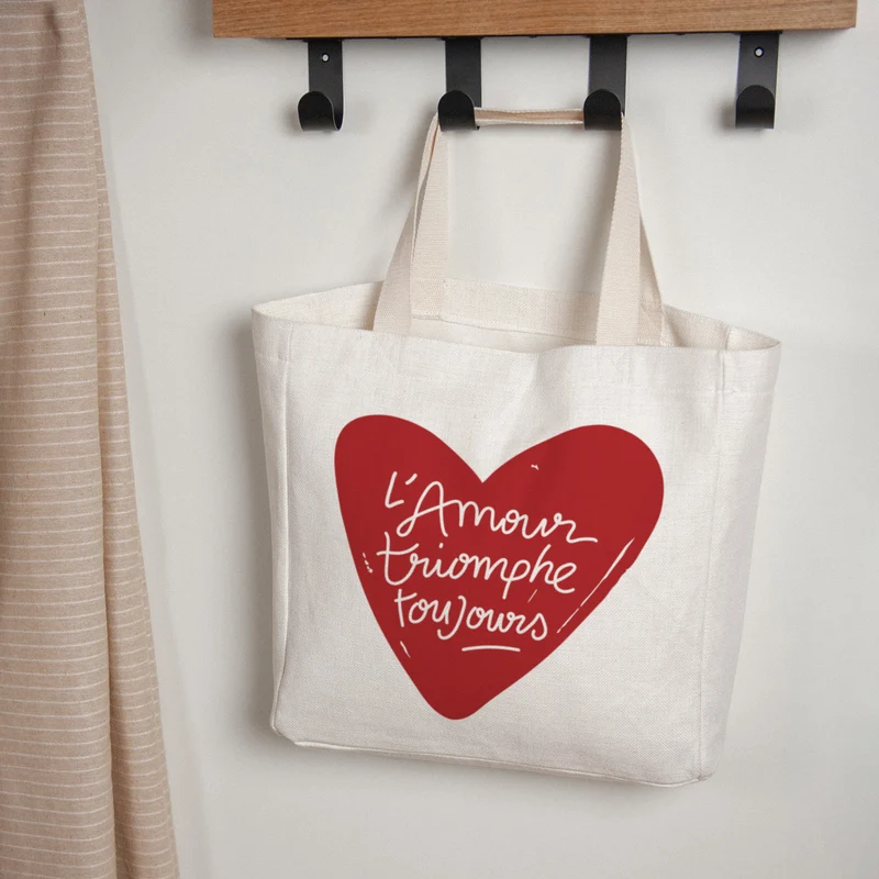 Tote bag Anse en toile L'Amour Triomphe Toujours