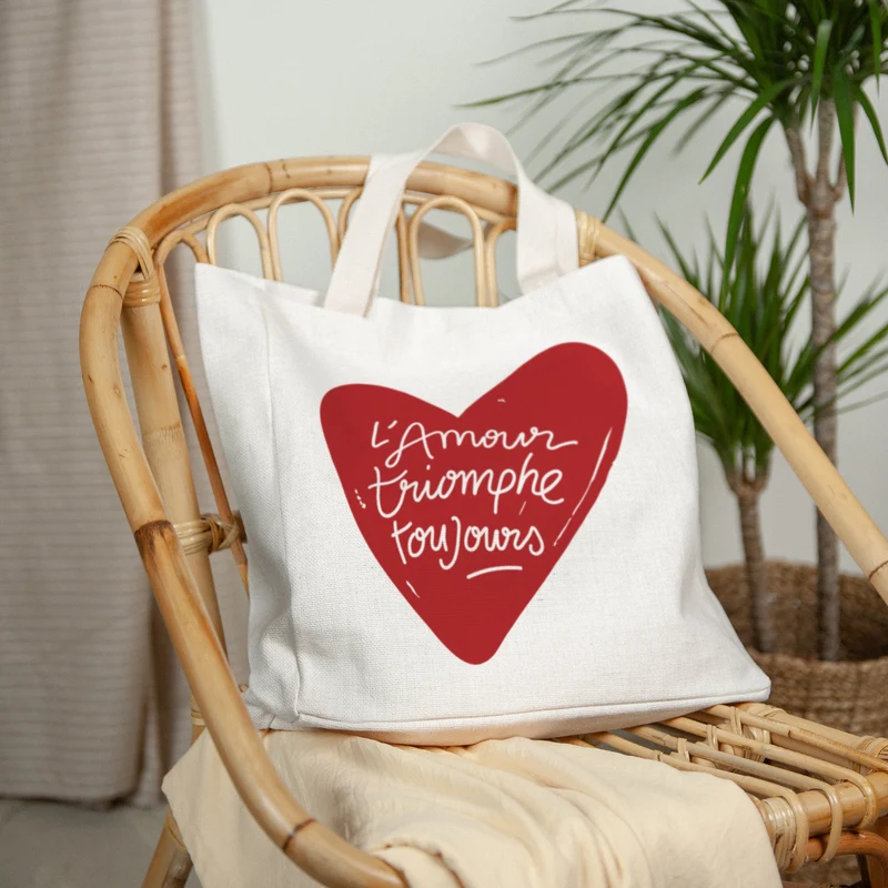 Tote bag Anse en toile L'Amour Triomphe Toujours