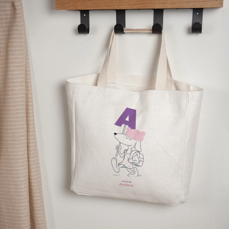 Tote bag Anse en toile Des chiens et des lettres violettes