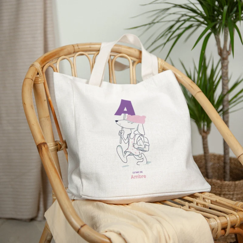 Tote bag Anse en toile Des chiens et des lettres violettes