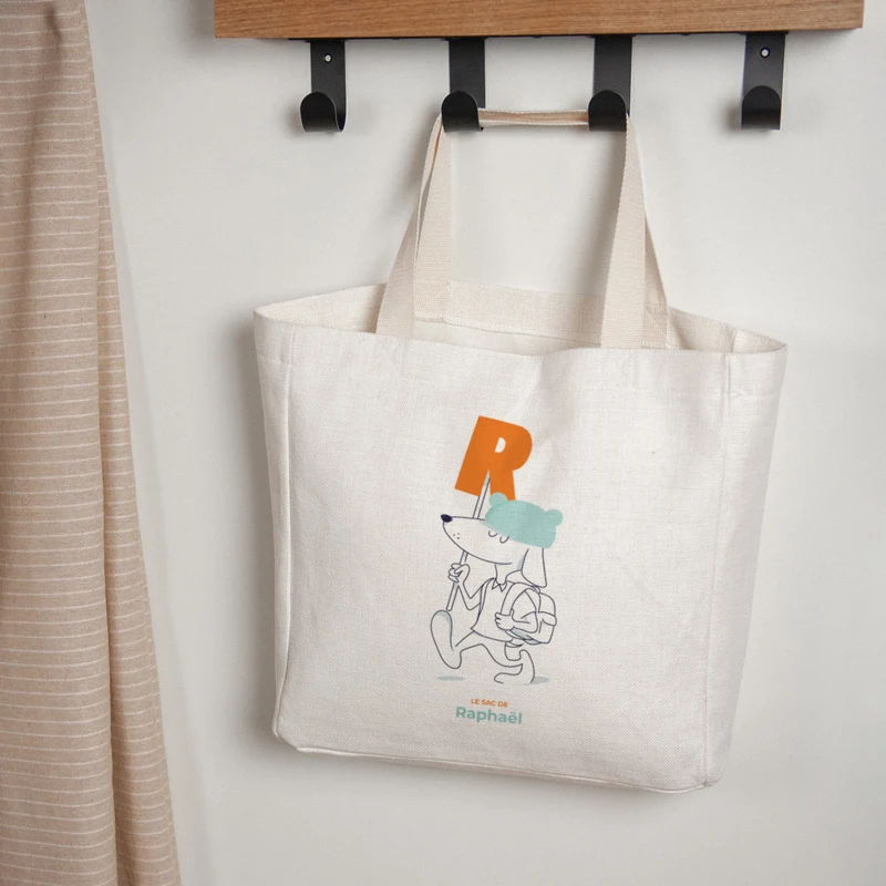 Tote bag Anse en toile Des chiens et des lettres oranges